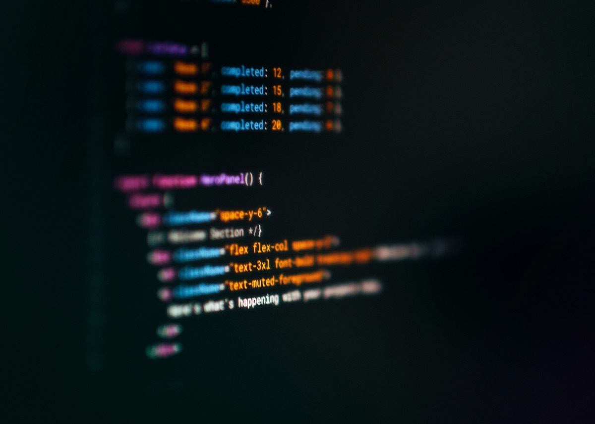 Code editor showing application logic on a dark screen