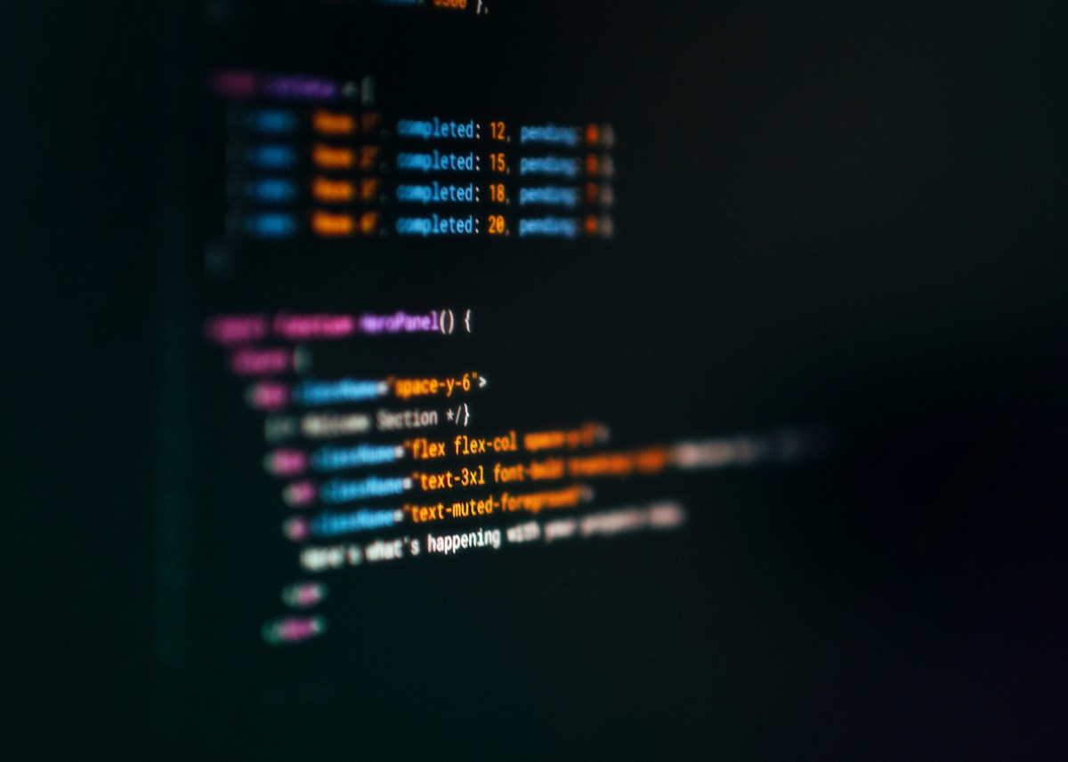 Code editor showing application logic on a dark screen